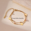 Detail of gold double-layer bracelet with clover charms and pink stones showing 17cm length - Clover Double Layer Bracelet