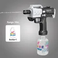 Automatic electric water gun in black and white UZI design with external water bottle - UZI Electric Black (Battery Type)