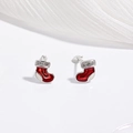 Macro shot of festive red enamel Christmas stocking stud earrings with small rhinestones - Red Christmas Sock Earrings