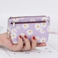 Purple faux leather coin purse with white daisy print and double zipper design - Purple