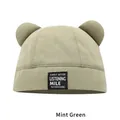 Mint green knit beanie with bear ears and a black letter patch for a cute trendy style - M (54-58cm) / Mint Green
