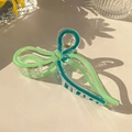 Bow-shaped jelly shark clip in mint green and teal translucent acrylic finish - Ribbon Bow Claw Clip / Turquoise Green