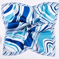 Detail of blue and white geometric striped silk scarf showing glossy satin fabric texture - Lake Blue Lines