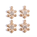 Macro view of four golden snowflake jewelry pendants with sparkling zircon crystals - Gold Micro Rhinestone Snowflake (Pack of 4)
