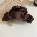 Detail of dark brown satin flower hair claw clip on a soft beige linen background - Dark Brown Satin Pleated Style