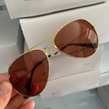 Classic aviator sunglasses with gold metal frame and dark brown lenses for sun protection - Gold Frame Tea Lens