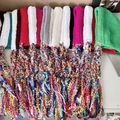 Colorful plush knitted beanies with long tassels in green, red, pink, and white options - Black