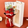 Three red soap roses with eucalyptus in red-black gift packaging and LOVE IS ribbon - 3 Red Roses Bouquet