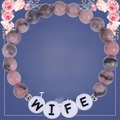 Pink zebra stone bracelet with WIFE letter beads on a floral gift message card - To My Beautiful Wife
