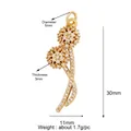 Golden flower pendant with white zircons and two spherical blooms measuring 30mm x 11mm - Exquisite Petal / Gold