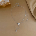 Silver butterfly necklace with crystal wings on textured silk fabric background - Spindle-Shaped Crystal Butterfly Style (白KM-193)