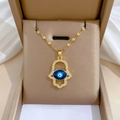 Golden Hamsa hand necklace with blue evil eye pendant in a premium jewelry box - J421 Titanium Steel Chain Copper Pendant