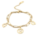 Elegant gold double-layer stainless steel bracelet featuring hollow G-letter pendants - Gold