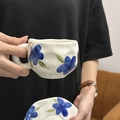 Hand-painted blue floral ceramic coffee cup and saucer set with scalloped edges - Blue Large Floral