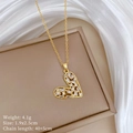 Detailansicht der hohlherz-halskette mit zirkonia und produktabmessungen - Goldener hohler Herzstil (E330)