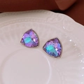 Macro detail of triangle crystal earrings with iridescent purple stones on a ceramic plate - Iridescent Purple Triangle Gem Style / Silver Earring Post - Silver - Purple