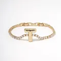 Gold plated tennis bracelet with T-letter pendant and sparkling white cubic zirconia stones - Letter T