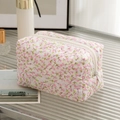 Quilted floral makeup bag with pink flowers and white zipper for travel storage - New Pink Floral