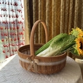 Handwoven pastoral storage basket in light brown with white lace and pearl bow details - Small Oval Pumpkin Basket With Hemp Rope Pearl