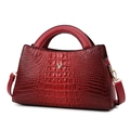 Red crocodile pattern leather handbag for women featuring gold hardware and a V-shaped metal logo - Single Bag / Red