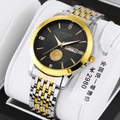 Details der ORUSS Herrenuhr mit goldfarbenem Zifferblatt, Doppeltagesanzeige und Stahlband - Segelboot Schwarzes Zifferblatt - Neun-Perlen Bicolor Armband