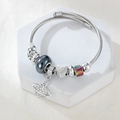 Silbernes Edelstahl-Charm-Armband mit Saturn-Anhänger und gravierter Herz-Perle - Schwarz