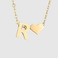 Collana minimalista dorata con un ciondolo a lettera R e un ciondolo a forma di cuore - Oro-R