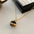 Tiger eye stone bead necklace with a golden circular pendant and delicate metal chain - Tiger Eye Necklace XL0261