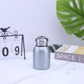 Mini silver 304 stainless steel vacuum flask with metal handle on marble surface - 300ml / Silver