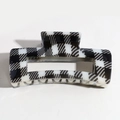 Chic hair claw clip featuring classic black and white houndstooth pattern in a rectangular shape - Black and White Plaid