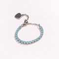Detail of adjustable blue bead bracelet with silver heart pendant and pull-string closure - Adjustable Open / Light Blue Zircon - Platinum Silver