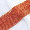Macro view of 2mm orange faceted crystal beads on soft white texture for jewelry DIY - 2mm (Approx. 210 Beads per Strand) / Burgundy