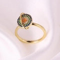 Macro view of gold Saturn ring featuring colorful pave crystals on white silk - Saturn Planet Shape Style (款式7)