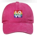 Hot pink washed cotton baseball cap featuring rainbow LOVE embroidery and curved brim - One Size / Rose Red