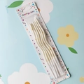 6-piece set of white twisted birthday candles with gold dots in clear blister packaging - White Curved Candle