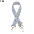 Close-up of blue and white geometric diamond woven bag strap with gold metal buckles - S-11 Lake Blue