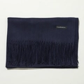 Detailed texture of dark blue cashmere scarf featuring soft fringes and a material tag - 70cm / Navy Blue