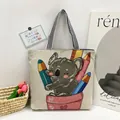 Canvas tote bag in beige with cute koala embroidery and striped handles on white background - Style 4 - Koala and Colored Pencils (Beige)