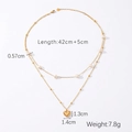 Detail showing gold heart pendant and pearl accents on a double-layer stainless steel necklace - Double Layered Heart Pearl Style (HC-N40363)