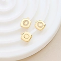 Macro detail of gold-plated square letter pendants with pavé zircon for DIY jewelry making - Letter O