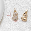 Detailed view of gold-plated letter S pendant with zircon inlay and 30x15mm dimensions - Letter S