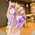 Purple acrylic lollipop keychain with honey silicone wrist strap and golden bell charm - Purple Luminous Color Bean Lollipop