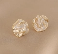 Detail of elegant gold-edged white camellia pearl earrings with textured 3D design - 3D Camellia Stud Earrings
