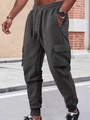 Close-up of deep gray waffle knit texture and large cargo pockets on men's jogger pants - Deep Heather Grey