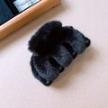 Detailed view of plush black faux fur hair claw clip with sturdy inner teeth for winter - Black Plush Claw Style