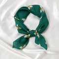 Green cotton linen square scarf with yellow floral pattern tied in a knot style - Orchid Dark Green Base