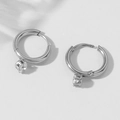 Silver-colored titanium steel hoop earrings featuring round-cut sparkling cubic zirconia - Silver
