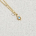 Golden sunburst necklace featuring a blue evil eye pendant with refined box chain - Gold Evil Eye Sun