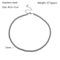 Detailed view of a 5mm stainless steel bead necklace with lobster clasp and extension chain - 5mm / Silver