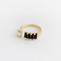 Detail of adjustable gold ring with rectangular transparent and black zircon stones - Adjustable Open / Black